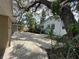 Backyard featuring large shade tree, open yard, and side of the house at 1536 S Martin Luther King Jr Ave, Clearwater, FL 33756