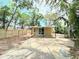 Spacious backyard featuring a concrete patio and partial view of home at 1536 S Martin Luther King Jr Ave, Clearwater, FL 33756