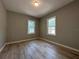Spacious bedroom with new floors and fresh paint, offering a clean and modern aesthetic at 1536 S Martin Luther King Jr Ave, Clearwater, FL 33756