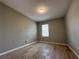 This bedroom features wood-look flooring and a window for natural light at 1536 S Martin Luther King Jr Ave, Clearwater, FL 33756
