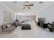 Cozy living room featuring stylish furnishings and neutral tones at 16866 Balance Cv, Land O Lakes, FL 34638