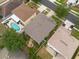 Aerial view showing a home with a backyard, patio, and inground pool at 18424 Cypress Bay Pkwy, Land O Lakes, FL 34638
