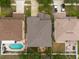 Aerial view showing a home with a backyard, patio, and inground pool at 18424 Cypress Bay Pkwy, Land O Lakes, FL 34638