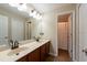 Bathroom with double sink vanity, and a separate shower area at 18424 Cypress Bay Pkwy, Land O Lakes, FL 34638