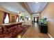 Spacious game room featuring a classic pool table and ample natural light at 18424 Cypress Bay Pkwy, Land O Lakes, FL 34638