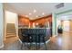 Stylish kitchen boasts stainless steel appliances, granite countertops, and modern pendant lighting at 18424 Cypress Bay Pkwy, Land O Lakes, FL 34638