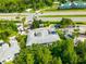 Overhead view of condos near road, parking, and landscaping at 1936 Heron Cove Dr # 104, Lutz, FL 33549