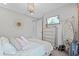 Bedroom featuring a decorative mirror and stylish decor at 21642 Emory Oak Pl, Land O Lakes, FL 34637