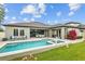 Gorgeous backyard pool and patio area, ideal for entertaining or relaxing outdoors at 21642 Emory Oak Pl, Land O Lakes, FL 34637