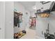 Spacious walk-in closet with clothing racks, shelving, and shoe storage provides ample space for organization at 21642 Emory Oak Pl, Land O Lakes, FL 34637