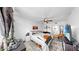 Bedroom showing a ceiling fan, a window, and modern décor at 2333 Feather Sound Dr # B309, Clearwater, FL 33762