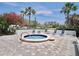 Cozy community hot tub surrounded by lush foliage and comfortable seating, ideal for relaxation and socializing at 2333 Feather Sound Dr # B309, Clearwater, FL 33762