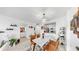 Dining area featuring modern decor and lighting fixture, open to the kitchen at 2333 Feather Sound Dr # B309, Clearwater, FL 33762