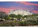 Multi-story building with blue roof accents and beautiful dusk skies at 2333 Feather Sound Dr # B309, Clearwater, FL 33762