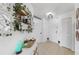 Bright hallway with neutral tile flooring and décor at 2333 Feather Sound Dr # B309, Clearwater, FL 33762