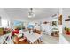 Living room featuring modern furniture and decor, with sliding glass door to the balcony at 2333 Feather Sound Dr # B309, Clearwater, FL 33762