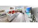 Bright living room leads to a balcony, offering a peek of outdoor living at 2333 Feather Sound Dr # B309, Clearwater, FL 33762