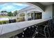 A view of the outdoor seating area overlooking the pool at 2333 Feather Sound Dr # B309, Clearwater, FL 33762
