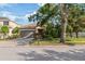 Inviting single-story home with mature landscaping and a two-car garage at 2903 Cypress Bowl Rd, Lutz, FL 33558