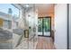 Modern bathroom with a glass-enclosed shower and stylish tile work at 3165 Renatta Dr, Belleair Bluffs, FL 33770