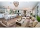 Spacious open-concept living area connecting the kitchen, dining, and living spaces at 3165 Renatta Dr, Belleair Bluffs, FL 33770