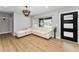 Cozy living room featuring a modern sectional sofa at 3165 Renatta Dr, Belleair Bluffs, FL 33770