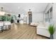 Open-concept home features a living area, kitchen and dining space at 3165 Renatta Dr, Belleair Bluffs, FL 33770