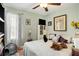 Bedroom featuring a bed and cat toys and natural lighting at 3203 Doe Ct, Brandon, FL 33511