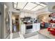 Open kitchen view that showcases stainless steel appliances and a breakfast nook with a view of the living area at 3203 Doe Ct, Brandon, FL 33511