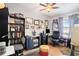 Office featuring a desk, chair, shelves, and natural lighting at 3203 Doe Ct, Brandon, FL 33511