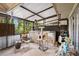 Patio featuring a cat tower and furniture with natural lighting at 3203 Doe Ct, Brandon, FL 33511