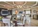 Well-decorated community room with plenty of seating, stylish decor, and ample lighting for social gatherings at 32242 Summerglade Dr, Wesley Chapel, FL 33545