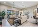 Spacious living room with sliding glass doors opening to the outdoor patio space at 32242 Summerglade Dr, Wesley Chapel, FL 33545