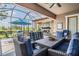 Enjoy the large screened-in patio with ample seating and outdoor views at 32242 Summerglade Dr, Wesley Chapel, FL 33545