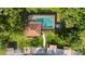 Aerial shot displaying the pristine community pool with ample lounge space and meticulous landscaping at 3366 Mermoor Dr # 1106, Palm Harbor, FL 34685