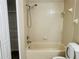 Well-lit bathroom featuring a shower-tub combination, great for relaxation at 3531 High Hampton Cir, Tampa, FL 33610