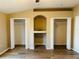 Bedroom featuring wood flooring and 3 closets providing ample storage at 3531 High Hampton Cir, Tampa, FL 33610