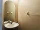 The powder room features a single sink and decorative mirror at 3531 High Hampton Cir, Tampa, FL 33610