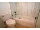 Bathroom featuring tiled shower and toilet at 36755 Thomas Jefferson Rd, Dade City, FL 33525