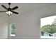 Bedroom featuring a ceiling fan, and natural light from the windows at 36755 Thomas Jefferson Rd, Dade City, FL 33525