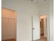 Bedroom featuring a view of the ensuite bathroom and walk-in closet at 36755 Thomas Jefferson Rd, Dade City, FL 33525