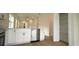 Well designed kitchen with white cabinets and stainless steel appliances at 36755 Thomas Jefferson Rd, Dade City, FL 33525