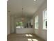 Bright living room area with wood floors, neutral paint, and lots of natural light at 36755 Thomas Jefferson Rd, Dade City, FL 33525