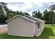 Backyard view of the house and yard at 36777 Thomas Jefferson Rd, Dade City, FL 33525