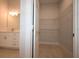 Bathroom includes wire shelving in the closet and single vanity at 36777 Thomas Jefferson Rd, Dade City, FL 33525