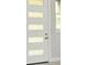 Modern entryway with a stylish door featuring frosted glass panes, complemented by neutral wall color at 36777 Thomas Jefferson Rd, Dade City, FL 33525