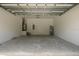 Spacious two car garage with door to the house at 36777 Thomas Jefferson Rd, Dade City, FL 33525