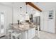 Modern kitchen with granite countertops, stainless steel appliances, and white cabinetry at 3912 Doral Dr, Tampa, FL 33634