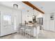 Bright kitchen with granite countertops, stainless steel appliances, and a charming breakfast bar at 3912 Doral Dr, Tampa, FL 33634
