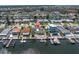 Waterfront home with boat dock access and lush landscaping at 4055 Floramar Ter, New Port Richey, FL 34652